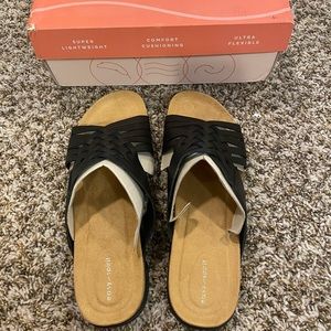 Never worn still in box black Easy Spirit sandals. Size 10m